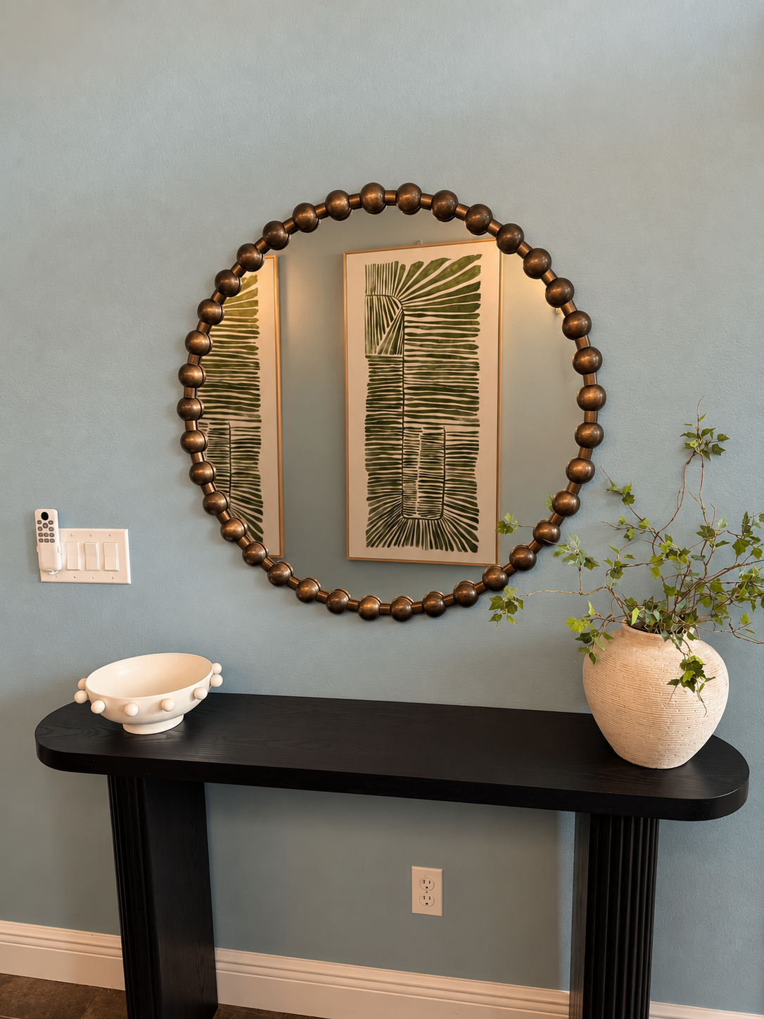 Modern entryway with botanical reflections at Dream Come True in Bradenton, Florida