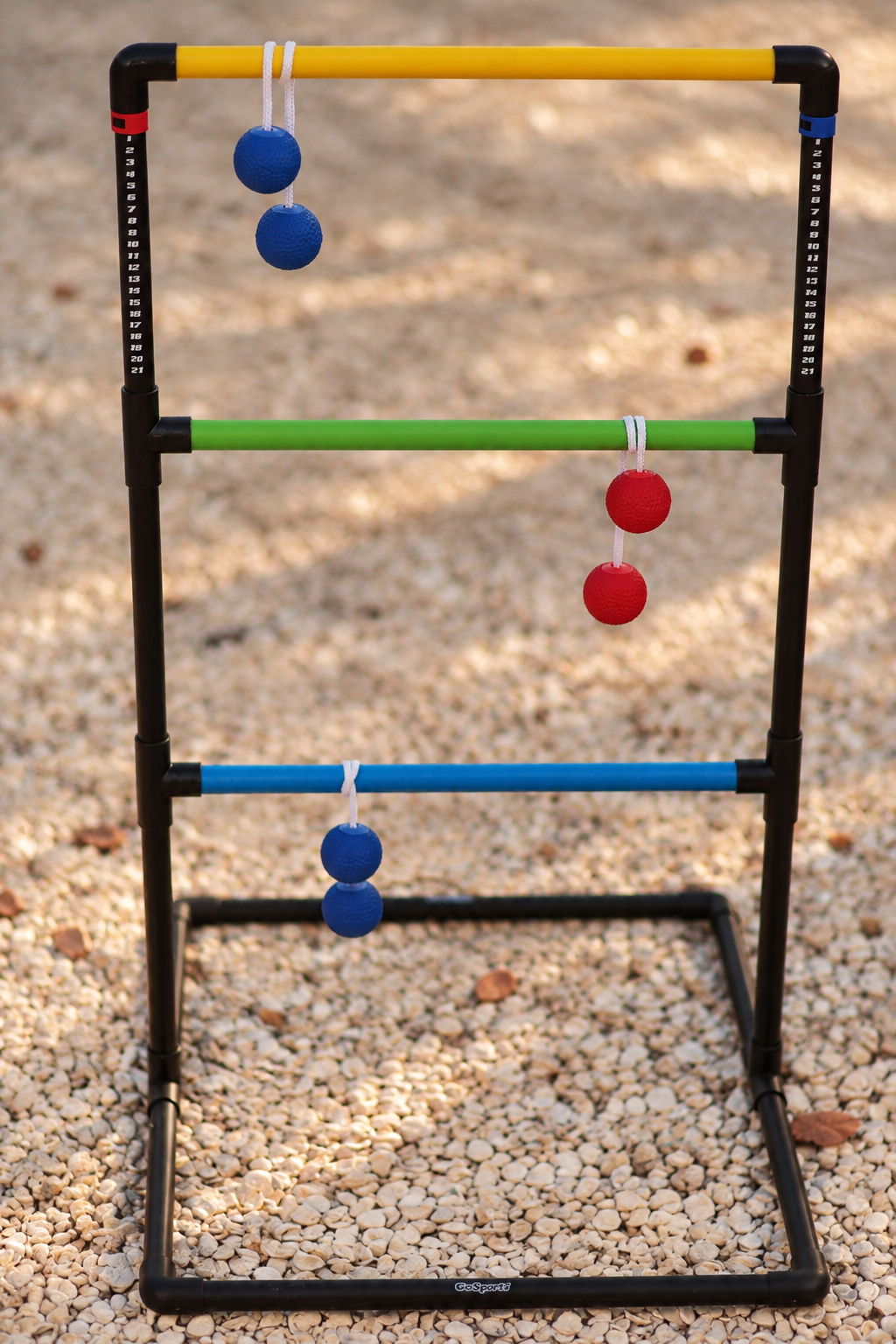 Colorful ladder toss on warm gravel at Dream Come True in Bradenton, Florida