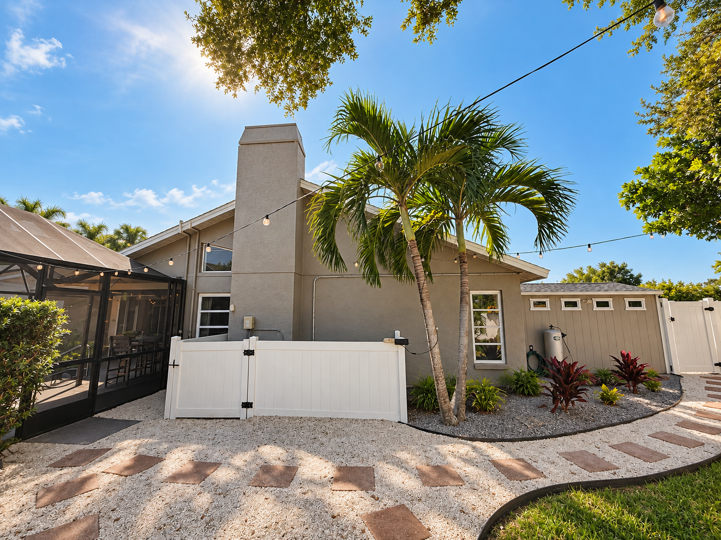 Sunny tropical backyard exterior at Dream Come True in Bradenton, Florida