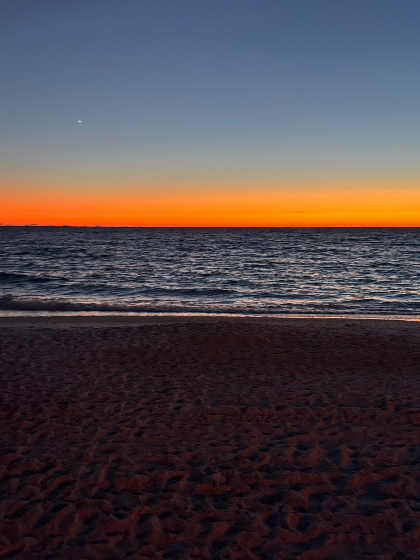 Vivid Gulf sunset over the beach near Bradenton, Florida
